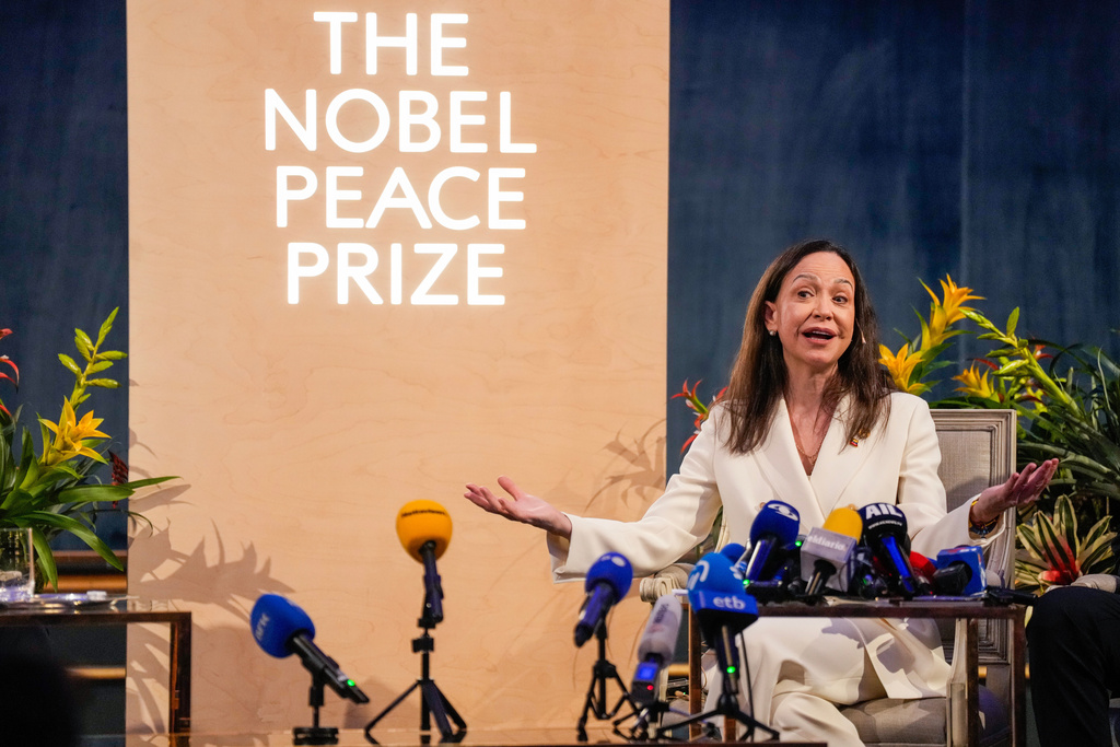 Nobel Peace Prize laureate Maria Corina Machado speaks during a press conference at the Grand Hotel in Oslo, Norway, Thursday, Dec. 11, 2025. (Heiko Junge/NTB Scanpix via AP)