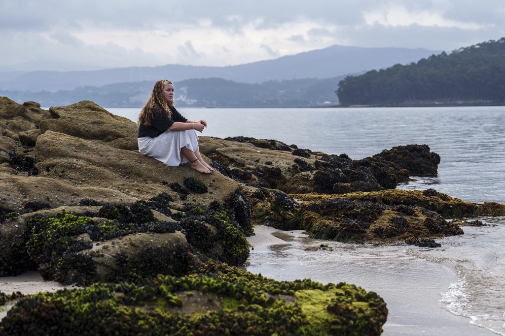 Helena Constela, head of communications for oceans advocacy group Seaspiracy, poses for a portrait Wednesday, June 25, 2025, in Pontevedra, Spain. (AP Photo/Annika Hammerschlag)