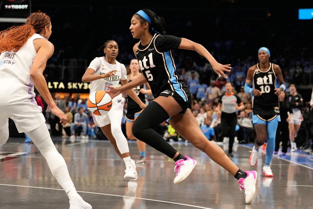 Atlanta Dream forward Angel Reese (5) dribbles during the second half of Game 3 of the WNBA basketball finals against the Golden State Valkyries on Wednesday, Oct. 21, 2026, in Atlanta. (AP Photo/Brynn Anderson)