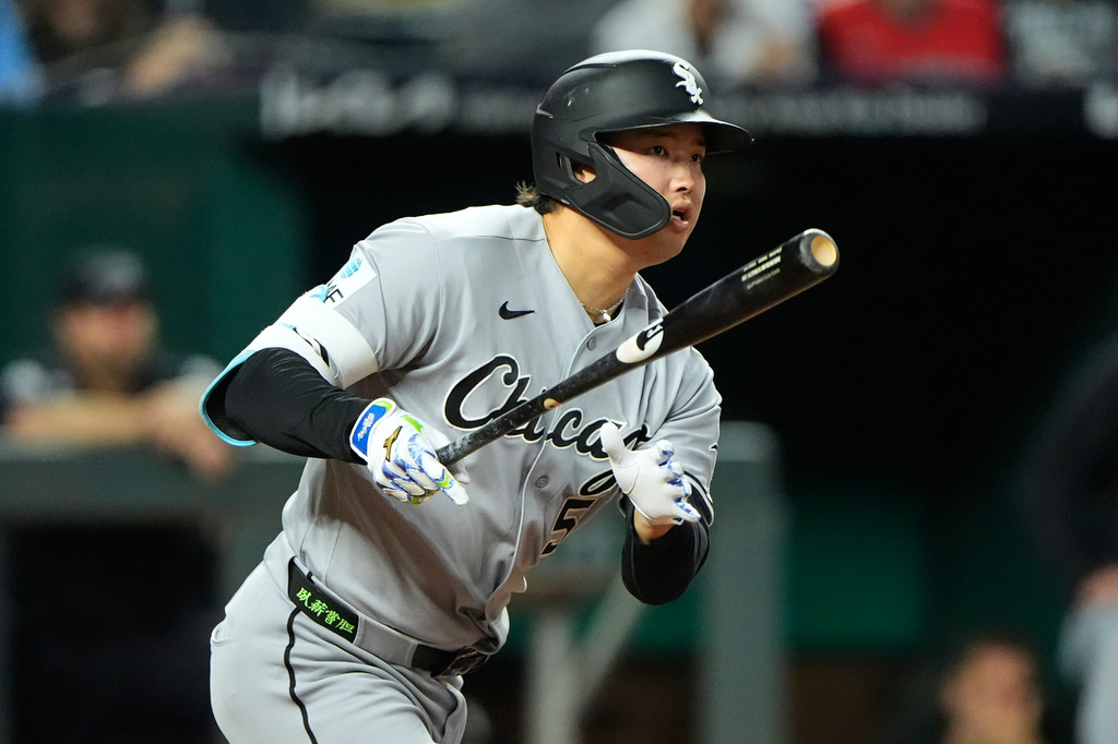 Chicago White Sox's Munetaka Murakami watches his RBI double during the third inning of a baseball game against the Kansas City Royals, Wednesday, Sept. 23, 2026, in Kansas City, Mo. (AP Photo/Charlie Riedel)