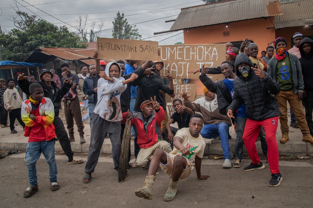 People protest in the streets of Arusha, Tanzania, Thursday, Oct. 30, 2025. (AP Photo)