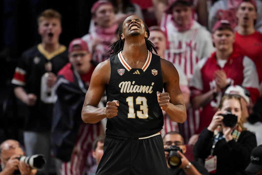Miami (Ohio) forward Antwone Woolfolk reacts during the first half of an NCAA college basketball game against Bowling Green, Friday, Feb. 20, 2026, in Oxford, Ohio. (AP Photo/Jeff Dean)
