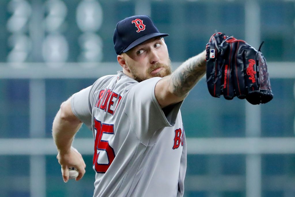 Boston Red Sox starting pitcher Garrett Crochet throws during the first inning of a baseball game against the Houston Astros, Wednesday, April 1, 2026, in Houston. (AP Photo/Michael Wyke)