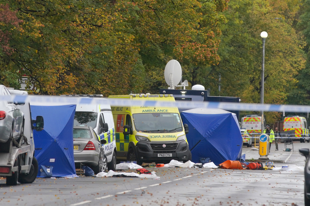 Police guard the scene of a stabbing incident at Heaton Park Hebrew Congregation synagogue, in Crumpsall, Manchester, England, Friday, Oct. 3, 2025, following Thursday's attack. (AP Photo/Ian Hodgson)