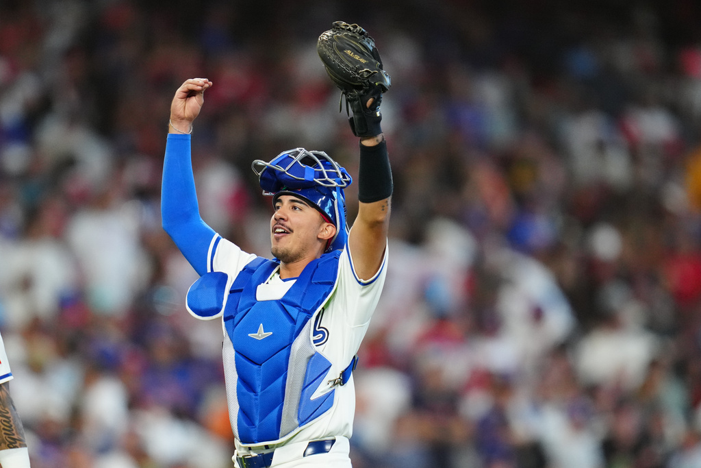 Italy catcher JJ D'Orazio celebrates a victory over Puerto Rico following a World Baseball Classic quarterfinal game, Saturday, March 14, 2026, in Houston. (AP Photo/Karen Warren)