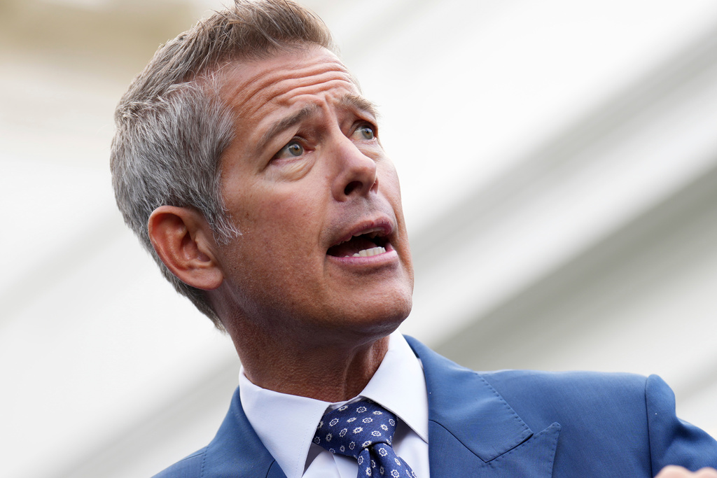 FILE - Transportation Secretary Sean Duffy speaks to the media about the impact of the government shutdown on the aviation industry, outside of the West Wing of the White House, Thursday, Oct. 30, 2025, in Washington. (AP Photo/Jacquelyn Martin, File)