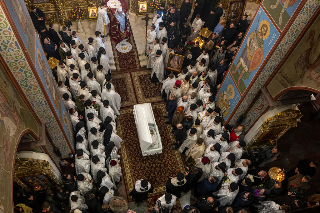 Clerics hold a funeral service for Patriarch Emeritus Filaret of Ukraine's Orthodox Church in St. Michael Cathedral in Kyiv, Ukraine, Friday, March 20, 2026. (AP Photo/Dan Bashakov)