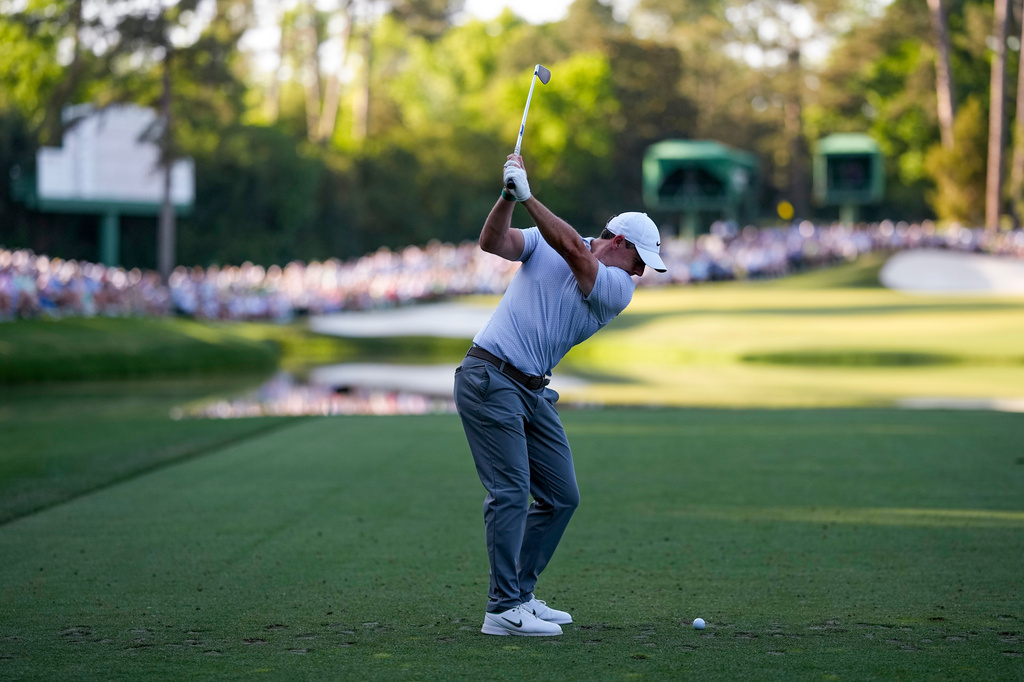 Rory McIlroy, of Northern Ireland, hits his tee shot on the 16th hole during the second round of the Masters golf tournament at the Augusta National Golf Club, Friday, April 10, 2026, in Augusta, Ga. (AP Photo/David J. Phillip)