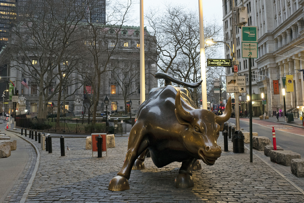 FILE - In this Jan. 10, 2020, file photo, the Charging Bull stands in Manhattan's financial district in New York. (AP Photo/Mark Lennihan, File)