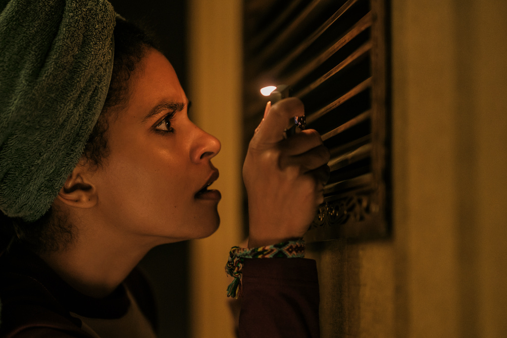 This image released by Warner Bros. Pictures shows Zazie Beetz in a scene from "They Will Kill You." (Warner Bros. Pictures via AP)