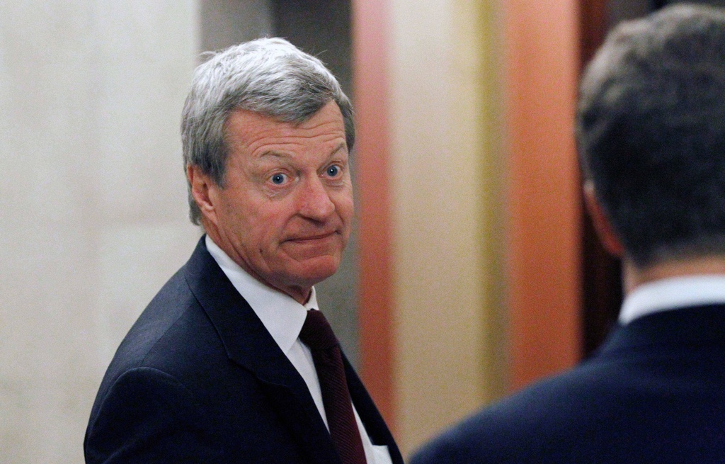 FILE - Sen. Max Baucus, D-Mont., enters the Speaker's office for a meeting about tax cuts on Capitol Hill in Washington, Dec. 1, 2010.(AP Photo/Alex Brandon, File)