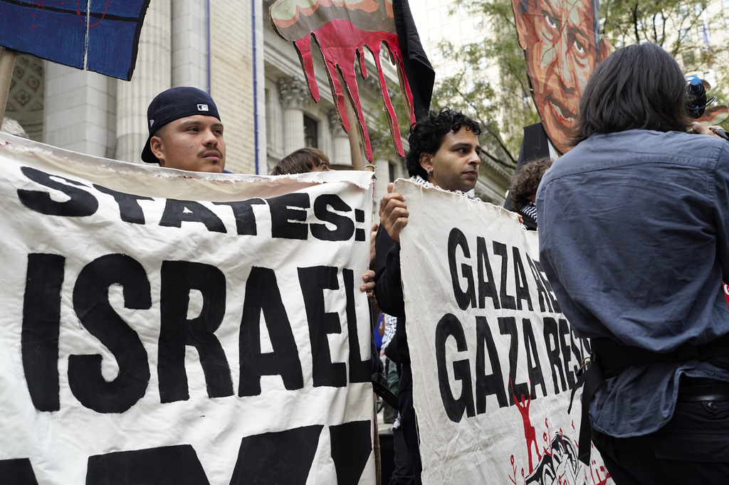 Demonstrators gather to protest following Israeli Prime Minister Benjamin Netanyahu's address at the 81st session of the United Nations General Assembly, Thursday, Sept. 24, 2026, in New York. (AP Photo/Madison Swart)