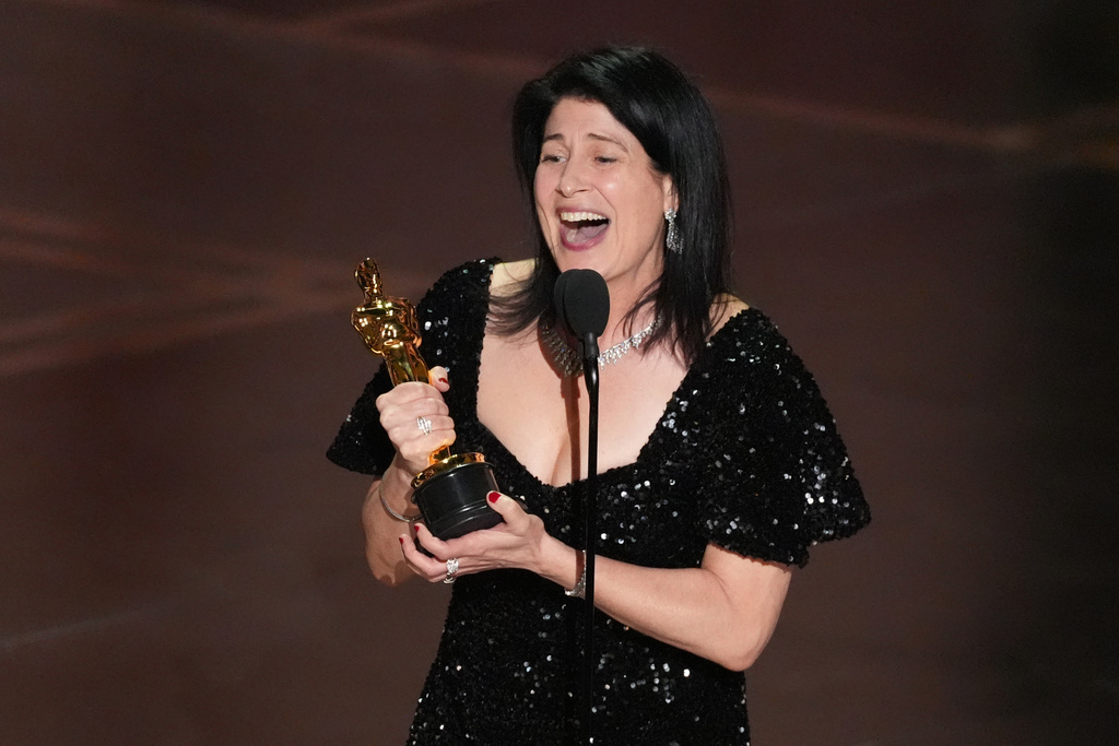 Cassandra Kulukundis accepts the award for casting for "One Battle After Another" during the Oscars on Sunday, March 15, 2026, at the Dolby Theatre in Los Angeles. (AP Photo/Chris Pizzello)