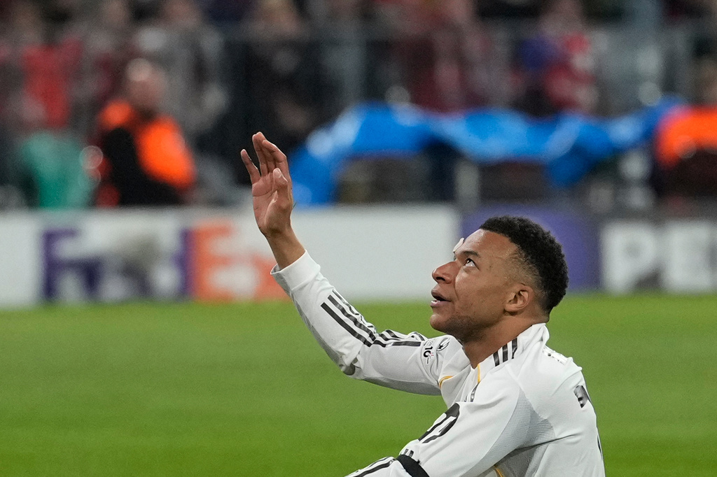 Real Madrid's Kylian Mbappe reacts after missing a scoring chance during the Champions League quarterfinal second leg soccer match between Bayern Munich and Real Madrid in Munich, Germany, Wednesday, April 15, 2026. (AP Photo/Matthias Schrader)