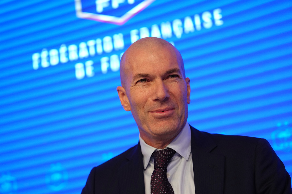 Zinedine Zidane, newly appointed coach of the France national soccer team, smiles during a media conference at the headquarters of French Football Federation headquarters in Paris, Tuesday, July 28, 2026. (AP Photo/Aurelien Morissard)