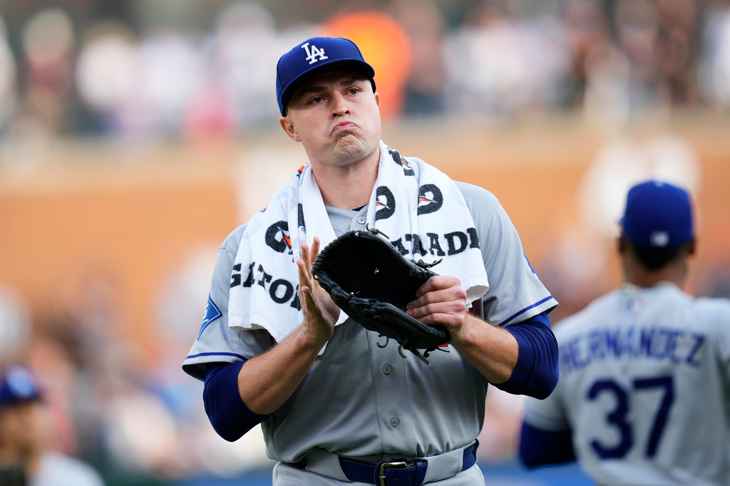 Los Angeles Dodgers pitcher Tarik Skubal claps as he walks to the dugout before the first inning of a baseball game against the Detroit Tigers Friday, Aug. 28, 2026, in Detroit. (AP Photo/Paul Sancya)