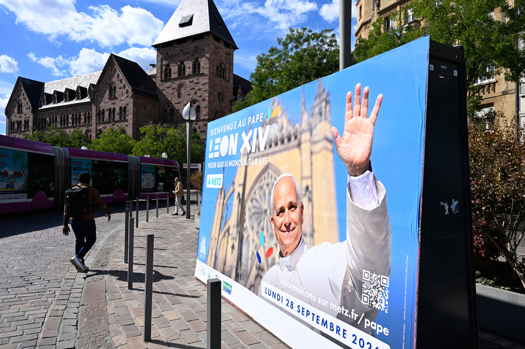 A banner announces the upcoming visit of Pope Leo XIV in Metz eastern France, Tuesday, Sept 15, 2026 as part of his official visit to France from Sept. 26 to 28. (AP Photo/Pascal Bastien)