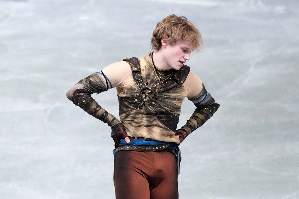 Ilia Malinin, of the United States, reacts after finishing the men's short program segment at the ISU Grand Prix of Figure Skating Final in Nagoya, central Japan, Thursday, Dec. 4, 2025. (AP Photo/Hiro Komae)