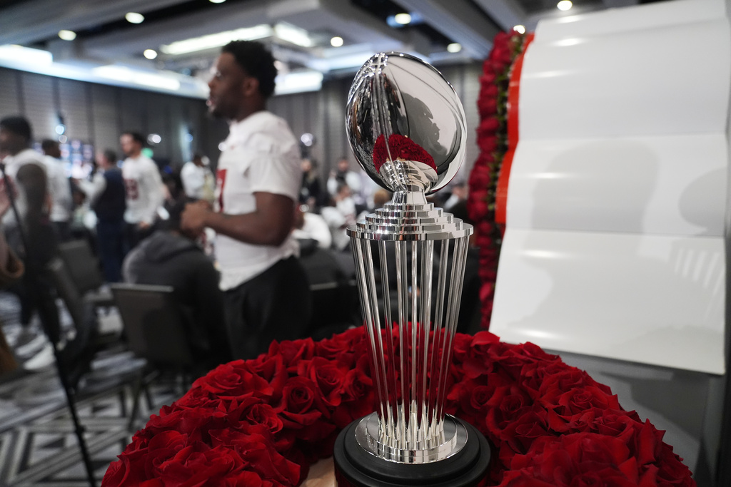 The Rose Bowl trophy is displayed during a press conference ahead of Thursday's Rose Bowl College Football Playoff between Alabama and IndianaTuesday, Dec. 30, 2025, in Los Angeles. (AP Photo/Marcio Jose Sanchez)