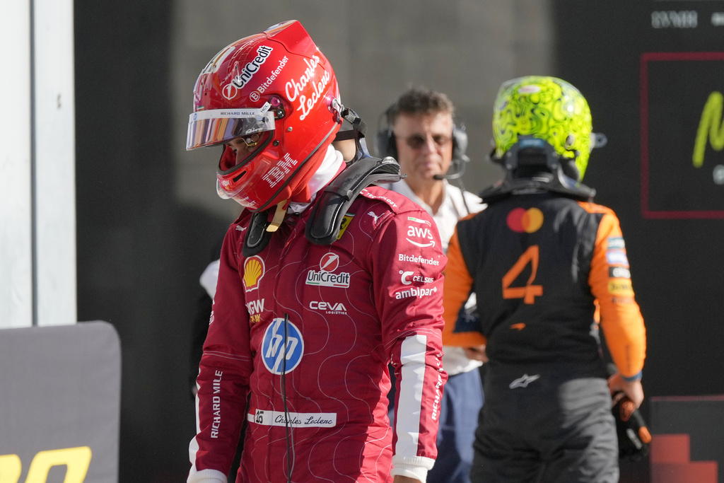 Ferrari driver Charles Leclerc of Monaco reacts after the qualifying session ahead of the Italian Grand Prix at the Monza racetrack in Monza, Italy, Saturday, Sept. 6, 2025. (AP Photo/Luca Bruno)