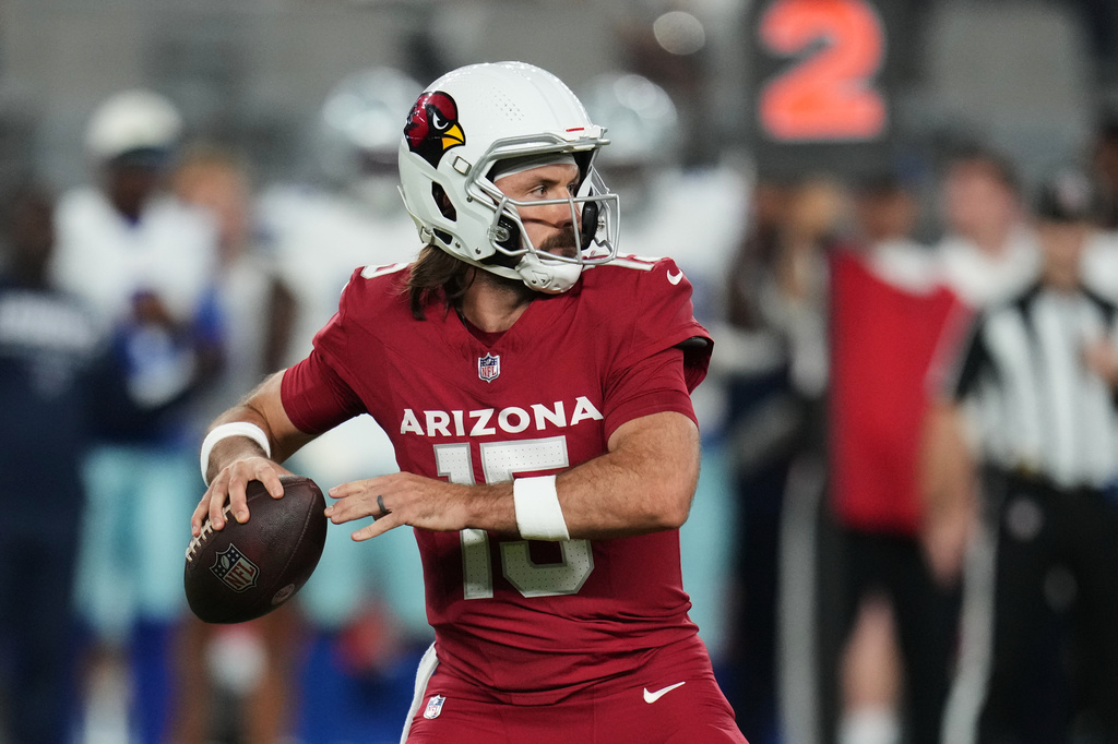 Arizona Cardinals quarterback Gardner Minshew II (15) throws a pass in the first half of a preseason NFL football game against the Dallas Cowboys Saturday, Aug. 22, 2026, in Glendale, Ariz. (AP Photo/Rick Scuteri)