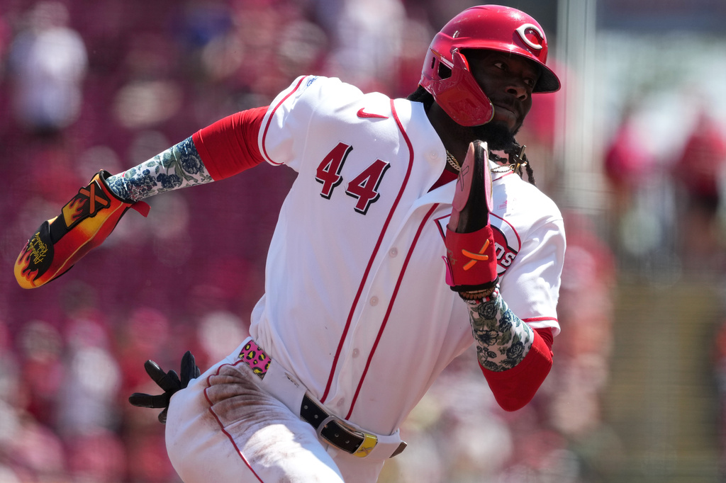 Cincinnati Reds' Elly de la Cruz advances to third base on a double by teammate Sal Stewart during the fourth inning of a baseball game against the Houston Astros, Sunday, May 10, 2026, in Cincinnati. (AP Photo/Kareem Elgazzar)