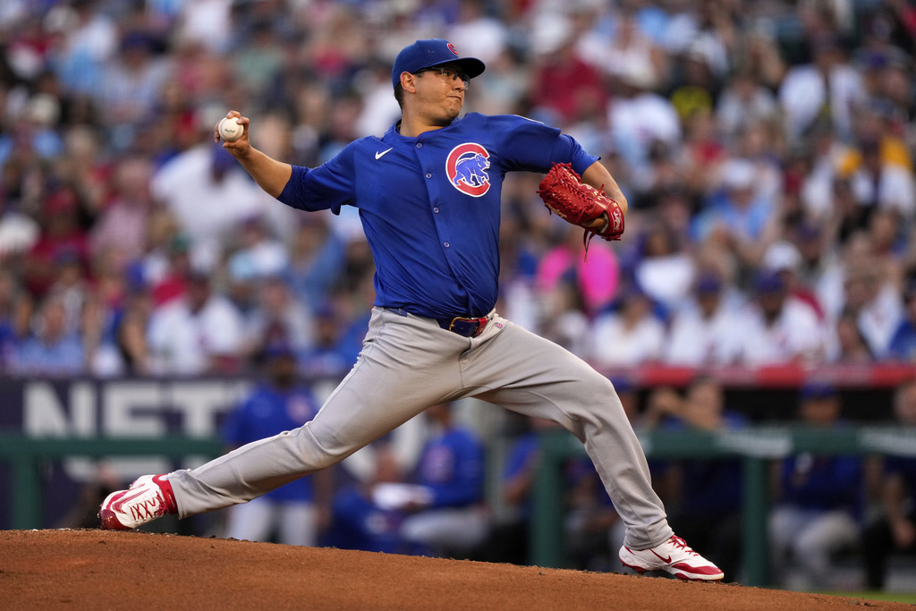 Chicago Cubs starting pitcher Javier Assad throws to the plate during the first inning of a baseball game against the Los Angeles Angels, Friday, Aug. 22, 2025, in Anaheim, Calif. (AP Photo/Mark J. Terrill)
