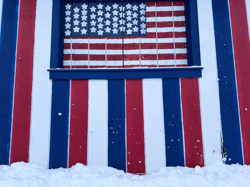 A shed is covered in snow in in Lowville, N.Y., on Friday, Nov. 28, 2025. (AP Photo/Cara Anna)