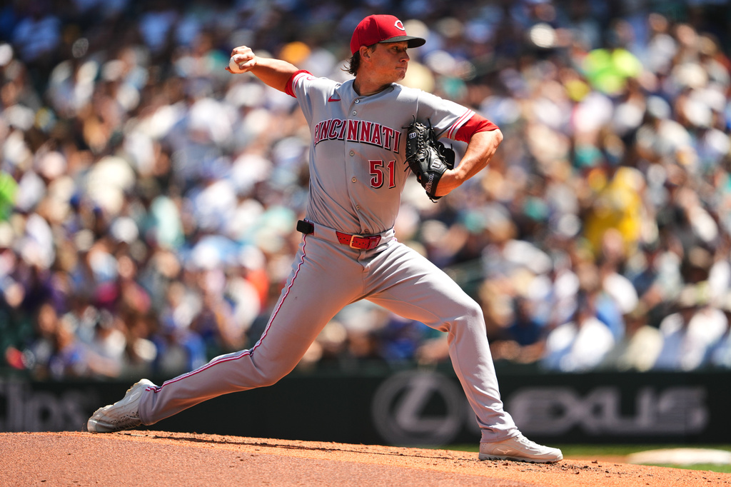 Cincinnati Reds starting pitcher Brady Singer throws against the Seattle Mariners during the fourth inning of a baseball game, Wednesday, July 22, 2026, in Seattle. (AP Photo/Lindsey Wasson)