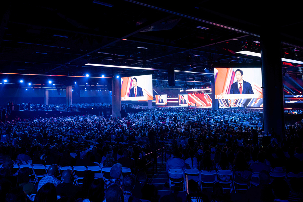 Michael Knowles speaks during Turning Point USA's AmericaFest 2025, Thursday, Dec. 18, 2025, in Phoenix. (AP Photo/Jon Cherry)