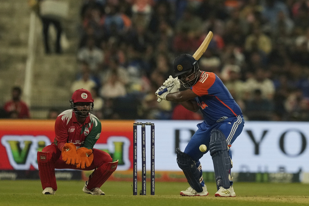 India's Sanju Samson plays a shot during the Asia Cup cricket match between India and Oman at Zayed Cricket Stadium in Abu Dhabi, United Arab Emirates, Friday, Sept. 19, 2025. (AP Photo/Altaf Qadri)