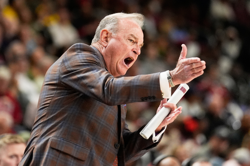 Texas head coach Vic Schaefer reacts to a call during first half of an NCAA college basketball game against Alabama in the quarterfinals of the Southeastern Conference tournament, Friday, March 6, 2026, in Greenville, S.C. (AP Photo/Chris Carlson)
