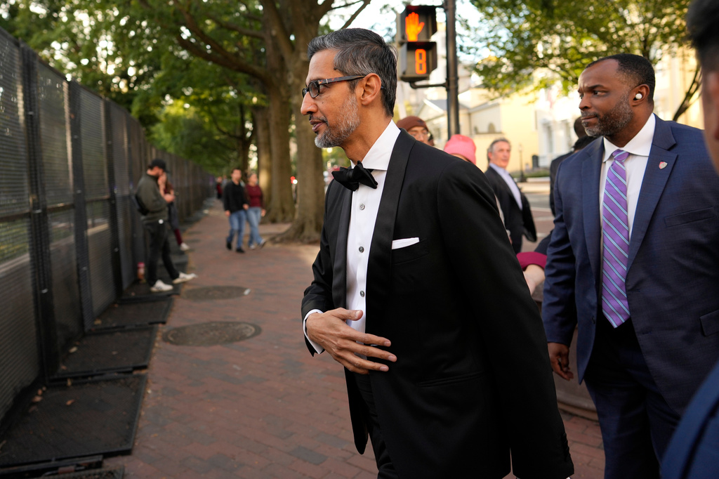 Google CEO Sundar Pichai walks to the White House to attend a state dinner hosted for China's President Xi Jinping, Thursday, Sept. 24, 2026, in Washington. (AP Photo/Carolyn Kaster)