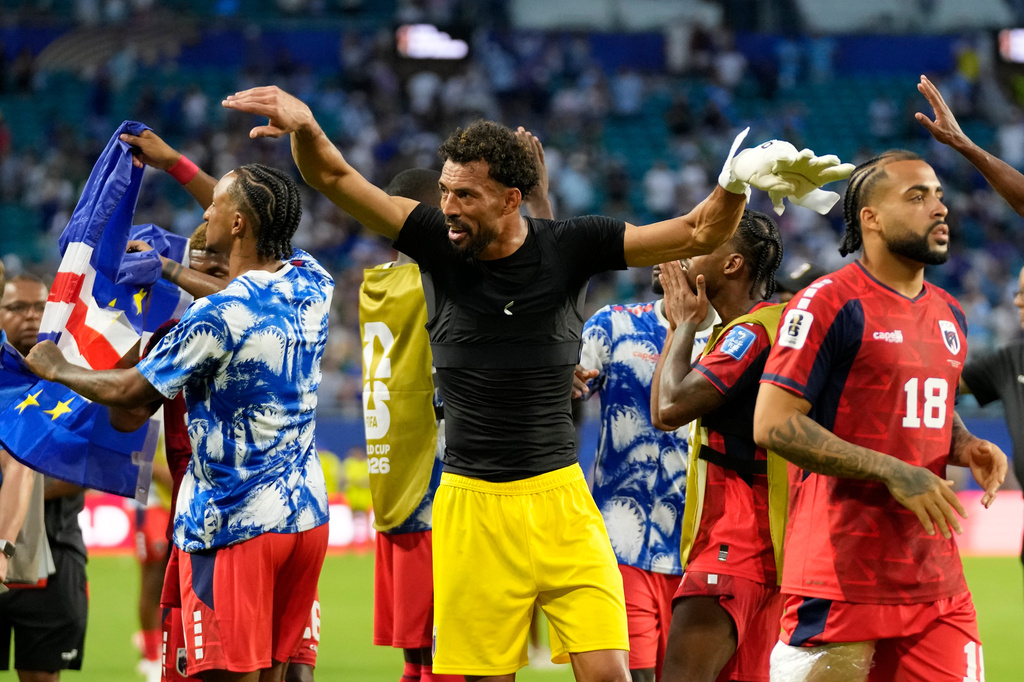 Cape Verde goalkeeper Vozinha, center, celebrates at the end of the World Cup Group H soccer match between Uruguay and Cape Verde in Miami Gardens, Fla., Sunday, June 21, 2026. (AP Photo/Lynne Sladky)