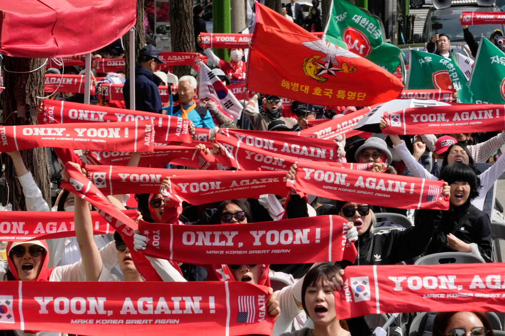 Supporters of former South Korean President Yoon Suk Yeol stage a rally outside of the Seoul High Court in Seoul, South Korea, Wednesday, April 29, 2026. (AP Photo/Ahn Young-joon)