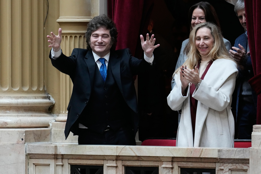 Argentina's President Javier Milei, left, and his sister, General Secretary of the Presidency Karina Milei, arrive to Congress to attend a session in which Chief of Staff Manuel Adorni will present his report to the Chamber of Deputies in Buenos Aires, Argentina, Wednesday, April 29, 2026. (AP Photo/Natacha Pisarenko)