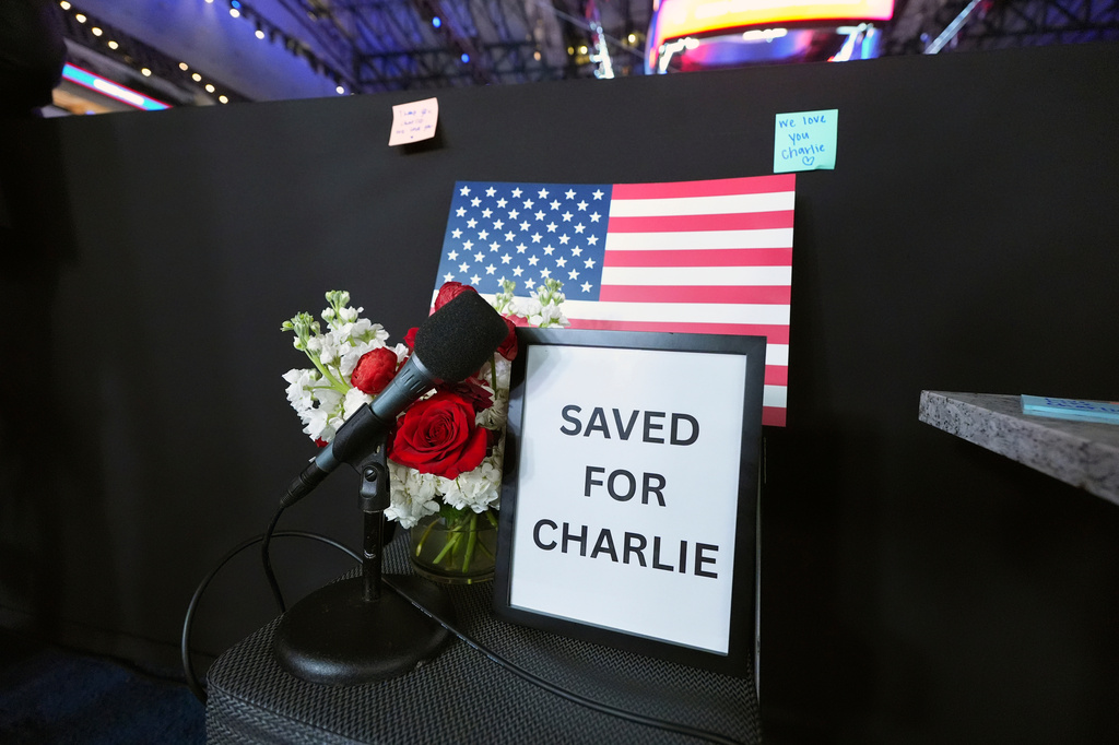 Post it notes are placed behind a memorial for Charlie Kirk at the "Creators Deck" for the media, at the Republican convention Thursday, Sept. 10, 2026, in Dallas. (AP Photo/Tony Gutierrez)