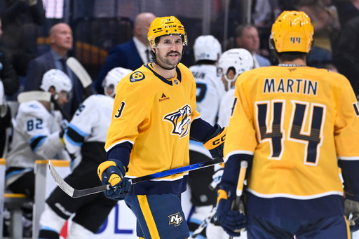 Nashville Predators left wing Filip Forsberg (9) talks to center Brady Martin (44) after scoring against the Nashville Predators during the first period of an NHL hockey game Saturday Oct. 11, 2025, in Nashville, Tenn. (AP Photo/John Amis) Nashville Predators left wing Filip Forsberg (9) talks to center Brady Martin (44) after scoring against the Nashville Predators during the first period of an NHL hockey game Saturday Oct. 11, 2025, in Nashville, Tenn. (AP Photo/John Amis)
