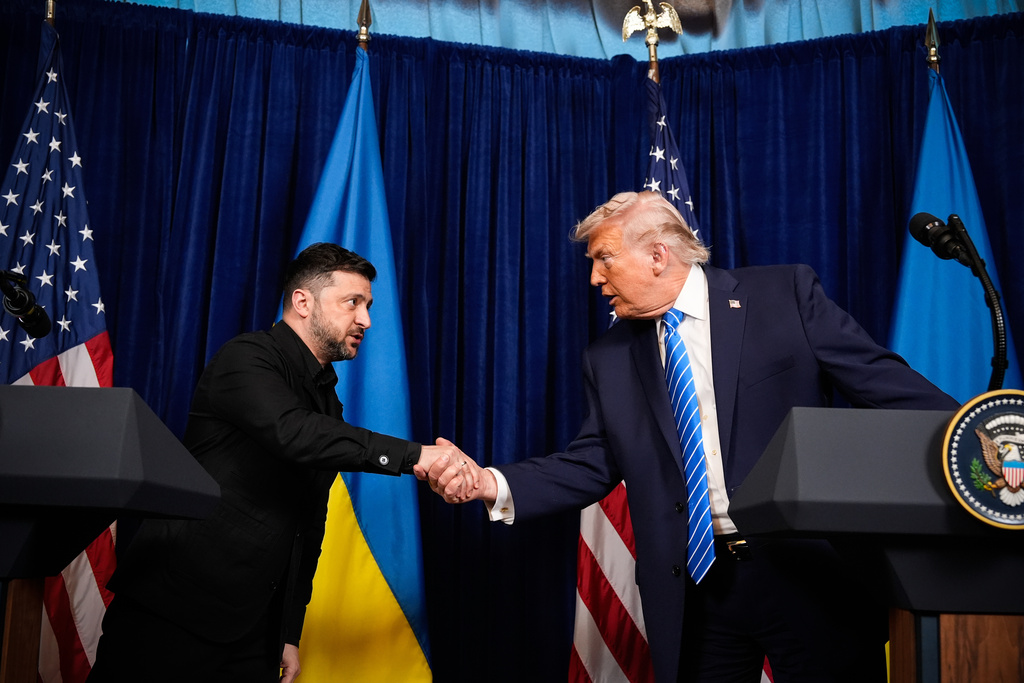 President Donald Trump and Ukraine's President Volodymyr Zelenskyy shake hands at the start of a joint news conference following a meeting at Trump's Mar-a-Lago club, Sunday, Dec. 28, 2025, in Palm Beach, Fla. (AP Photo/Alex Brandon)