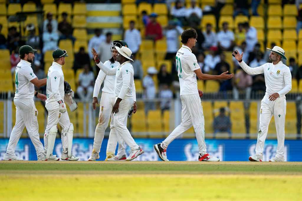 South Africa's Marco Jansen, second right, celebrates with teammates after the dismissal of India's Mohammed Siraj on the third day of the second cricket test match between India and South Africa in Guwahati, India, Saturday, Nov. 22, 2025. (AP Photo/Anupam Nath)