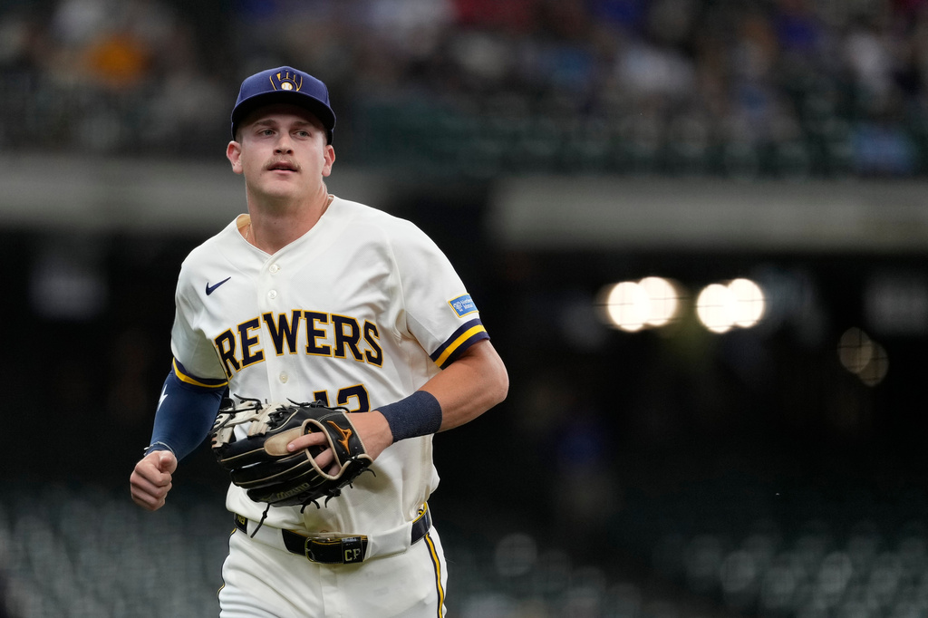 Milwaukee Brewers' Cooper Pratt jogs to the dugout during the first inning of a baseball game against the Cleveland Guardians, Tuesday, June 16, 2026, in Milwaukee. (AP Photo/Aaron Gash)