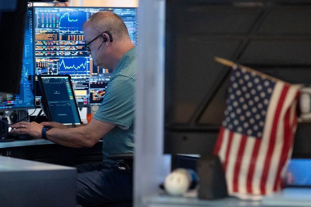 A trader works on the floor of the New York Stock Exchange in New York, Friday, Aug. 21, 2026. (AP Photo/Yuki Iwamura)