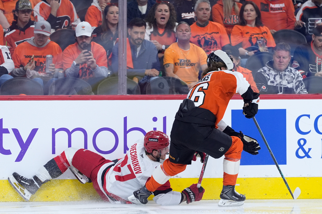 Carolina Hurricanes' Andrei Svechnikov, left, and Philadelphia Flyers' Trevor Zegras collide during the second period of Game 3 in the second round of the NHL hockey Stanley Cup playoffs, Thursday, May 7, 2026, in Philadelphia. (AP Photo/Matt Slocum)