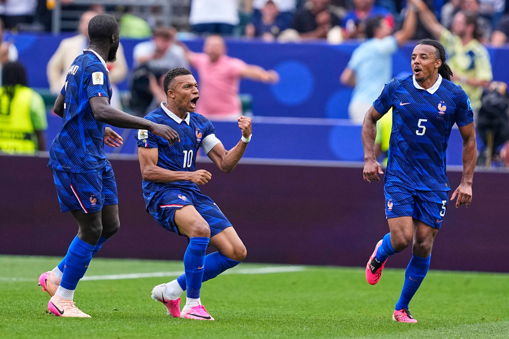France's Kylian Mbappe (10) celebrates after scoring his team's first goal during the World Cup Group I soccer match between France and Iraq in Philadelphia, Monday, June 22, 2026. (AP Photo/Petr David Josek)