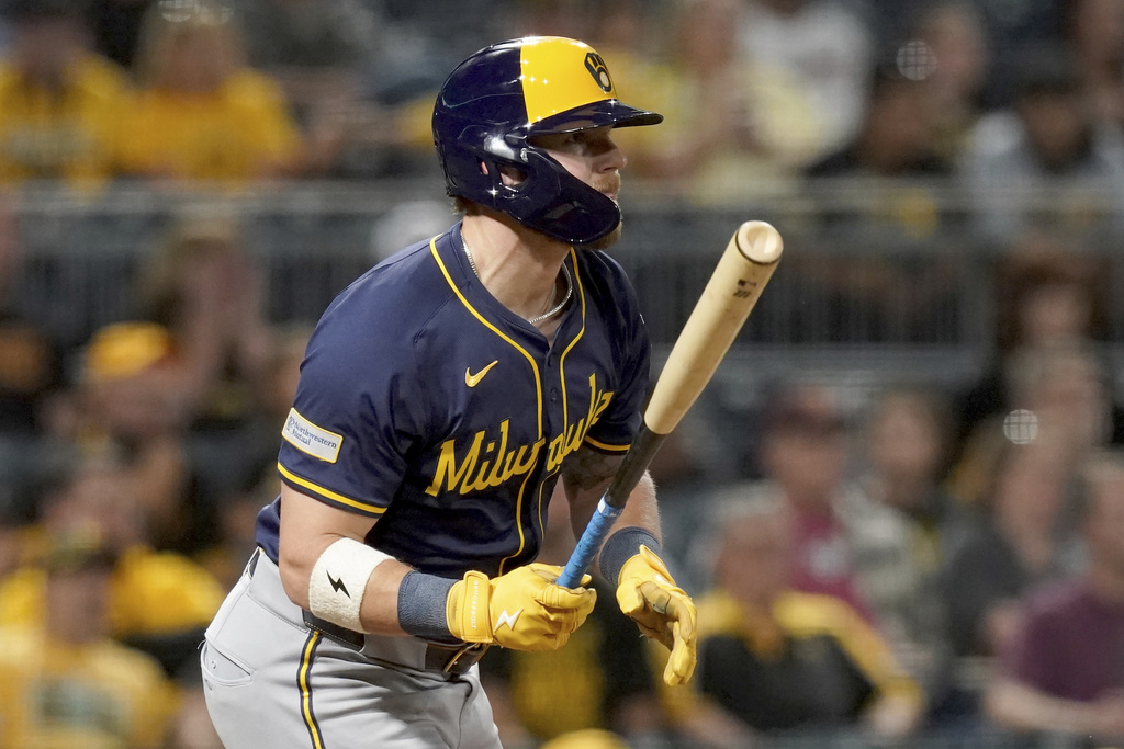 Milwaukee Brewers' Jake Bauers watches his RBI single during the sixth inning of a baseball game against the Pittsburgh Pirates, Friday, Sept. 5, 2025, in Pittsburgh. (AP Photo/Matt Freed)