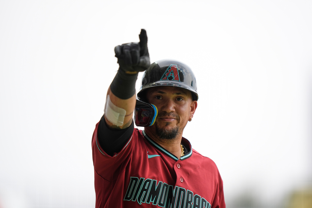 Arizona Diamondbacks' Ildemaro Vargas celebrates after hitting a home run against the San Diego Padres during the sixth inning of a baseball game in Mexico City, Sunday, April 26, 2026. (AP Photo/Fernando Llano)