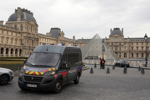 A police car patrols in the courtyard of the closed Louvre museum after a robbery Sunday, Oct. 19, 2025 in Paris. (AP Photo/Thibault Camus) A police car patrols in the courtyard of the closed Louvre museum after a robbery Sunday, Oct. 19, 2025 in Paris. (AP Photo/Thibault Camus)