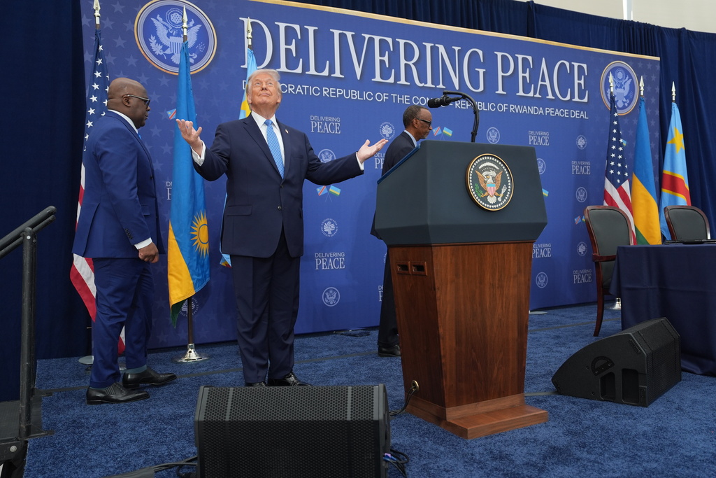 President Donald Trump arrives for a signing ceremony with Rwanda's President Paul Kagame and Democratic Republic of Congo President Felix-Antoine Tshisekedi at the U.S. Institute of Peace, Thursday, Dec. 4, 2025, in Washington. (AP Photo/Evan Vucci)