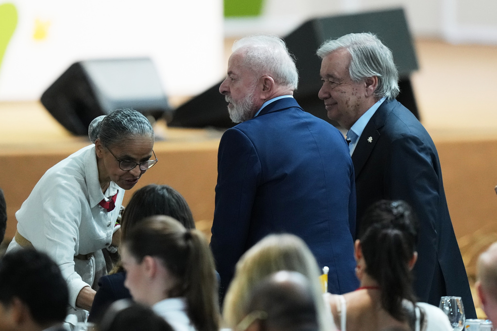 Brazil President Luiz Inacio Lula da Silva, center, U.N. Secretary-General Antonio Guterres, right, and Brazil Environment Minister Marina Silva attend a plenary session at the COP30 U.N. Climate Summit in Belem, Brazil, Thursday, Nov. 6, 2025. (AP Photo/Fernando Llano)
