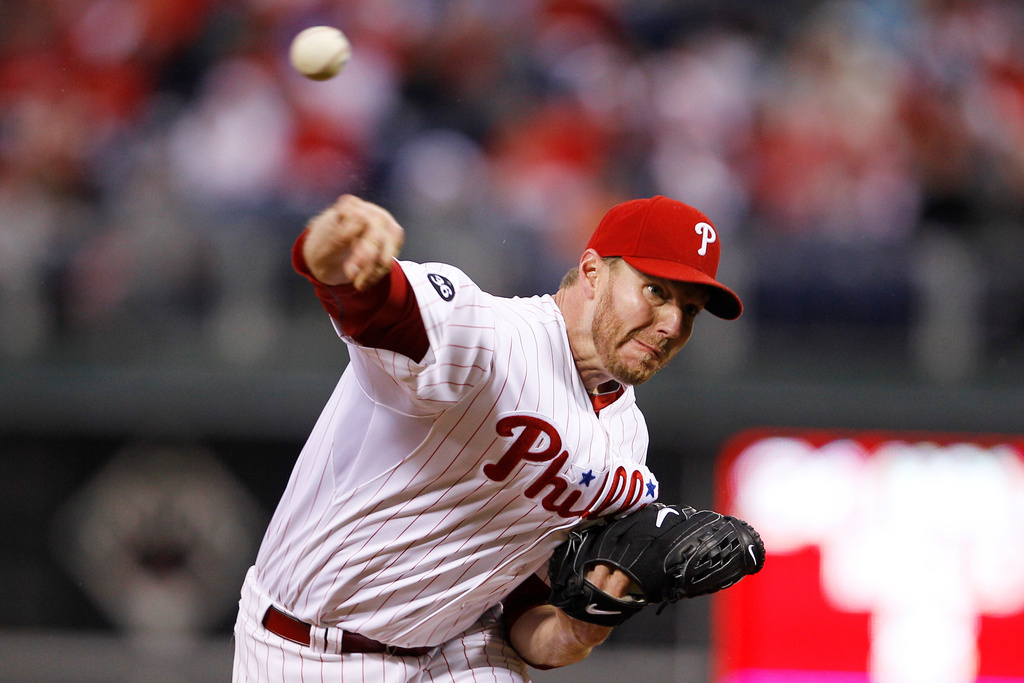 FILE - Philadelphia Phillies starting pitcher Roy Halladay throws to a Cincinnati Reds batter during the fifth inning of Game 1 of the National League Division baseball series Wednesday, Oct. 6, 2010, in Philadelphia. (AP Photo/Matt Slocum, File)